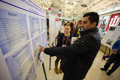 Research Symposium presentation in Alumni Hall.