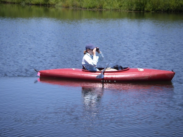 Lina in a boat.